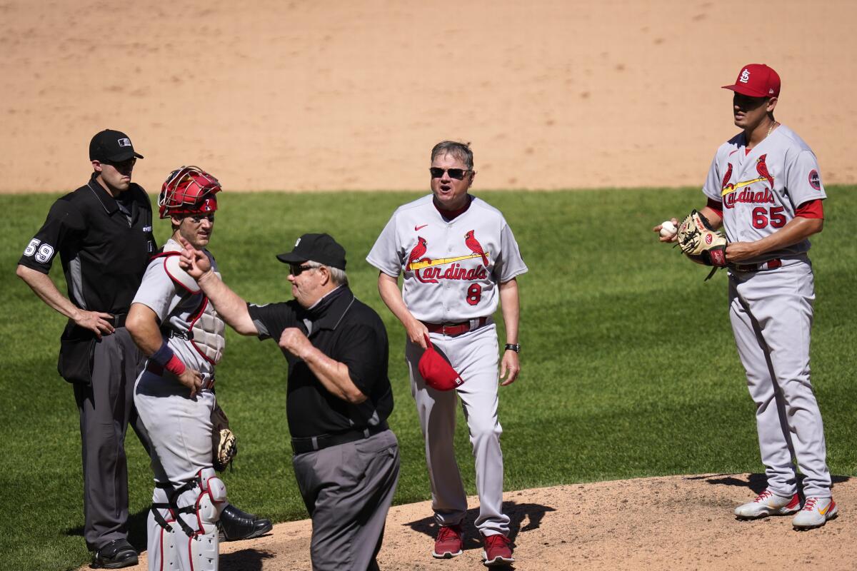 Gallegos ordered to switch caps by ump in Cards' 4-0 loss - The